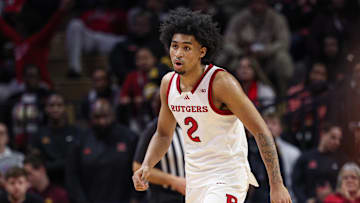 Mar 9, 2025; Piscataway, New Jersey, USA; Rutgers Scarlet Knights guard Dylan Harper (2) in action during overtime against the Minnesota Golden Gophers at Jersey Mike's Arena. Mandatory Credit: Vincent Carchietta-Imagn Images