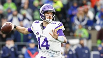 Dec 22, 2024; Seattle, Washington, USA; Minnesota Vikings quarterback Sam Darnold (14) passes against the Seattle Seahawks during the third quarter at Lumen Field. Mandatory Credit: Joe Nicholson-Imagn Images
