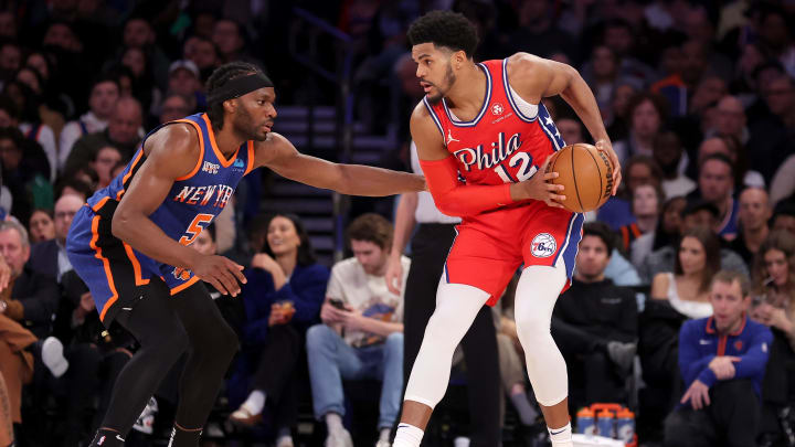 Mar 10, 2024; New York, New York, USA; Philadelphia 76ers forward Tobias Harris (12) controls the ball against New York Knicks forward Precious Achiuwa (5) during the third quarter at Madison Square Garden. Mandatory Credit: Brad Penner-USA TODAY Sports