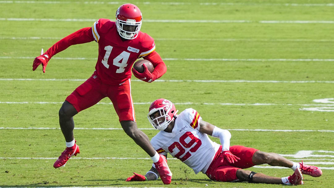 Aug 3, 2021; St. Joseph, Missouri, USA; Kansas City Chiefs wide receiver Cornell Powell (14) runs against cornerback BoPete Keyes (29) during training camp at Missouri Western State University. Mandatory Credit: Jay Biggerstaff-Imagn Images