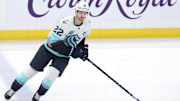 Jan 16, 2025; Winnipeg, Manitoba, CAN; Seattle Kraken right wing Oliver Bjorkstrand (22) warms up before a game against the Winnipeg Jets at Canada Life Centre. Mandatory Credit: James Carey Lauder-Imagn Images