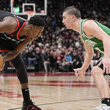 Jan 15, 2024; Toronto, Ontario, CAN; Toronto Raptors RJ Barrett (9) stares at Boston Celtics guard Payton Pritchard (11) during the second half at Scotiabank Arena. Mandatory Credit: John E. Sokolowski-Imagn Images