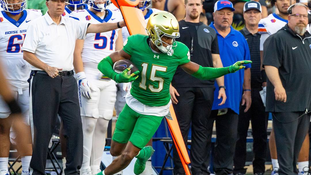 Oct 4, 2025; South Bend, Indiana, USA; Notre Dame Fighting Irish cornerback Leonard Moore (15) comes up with an interception against the Boise State Broncos at Notre Dame Stadium. Mandatory Credit: Michael Caterina-Imagn Images Oct 4, 2025; South Bend, Indiana, USA; Notre Dame Fighting Irish cornerback Leonard Moore (15) comes up with an interception against the Boise State Broncos at Notre Dame Stadium. Mandatory Credit: Michael Caterina-Imagn Images
