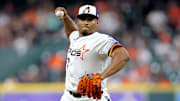 Houston Astros starting pitcher Luis Garcia (77) delivers a pitch against the Los Angeles Angels during the first inning at Daikin Park. 