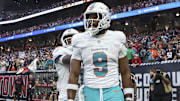 Dec 15, 2024; Houston, Texas, USA; Miami Dolphins tight end Jonnu Smith (9) reacts after a touchdown reception during the game against the Houston Texans at NRG Stadium. Mandatory Credit: Troy Taormina-Imagn Images
