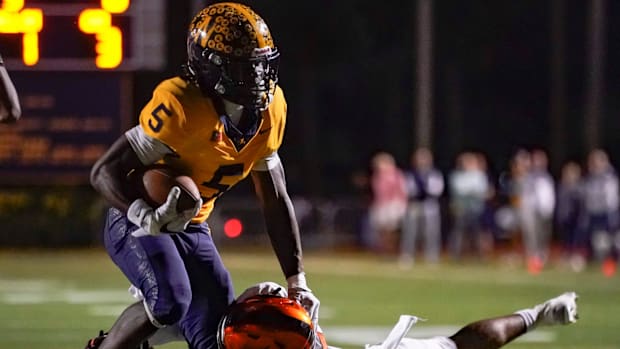 Naples Golden Eagles running back Shawn Simeon went for 300 yards and four TDs in a win over Lely.