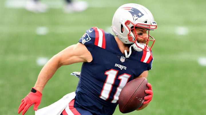 Oct 25, 2020; Foxborough, Massachusetts, USA; New England Patriots wide receiver Julian Edelman (11) runs with the ball during warmups before a game against the San Francisco 49ers at Gillette Stadium. Mandatory Credit: Brian Fluharty-Imagn Images