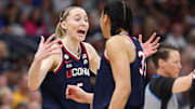 Connecticut Huskies guard Paige Bueckers (5) and guard Azzi Fudd (35) speak during the second half against the South Carolina Gamecocks of the national championship of the women's 2025 NCAA tournament.