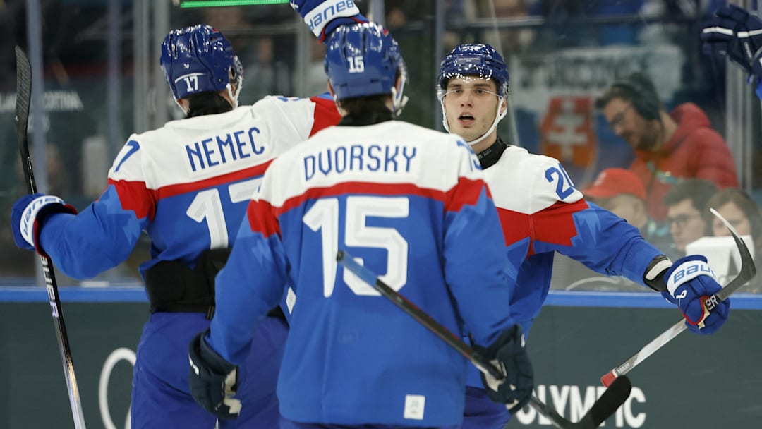Feb 11, 2026; Milan, Italy; Juraj Slafkovsky of Slovakia celebrates scoring their third goal with Simon Nemec of Slovakia and Dalibor Dvorsky of Slovakia against Finland in men's ice hockey group B play during the Milano Cortina 2026 Olympic Winter Games at Milano Santagiulia Ice Hockey Arena. Mandatory Credit: Geoff Burke-Imagn Images Feb 11, 2026; Milan, Italy; Juraj Slafkovsky of Slovakia celebrates scoring their third goal with Simon Nemec of Slovakia and Dalibor Dvorsky of Slovakia against Finland in men's ice hockey group B play during the Milano Cortina 2026 Olympic Winter Games at Milano Santagiulia Ice Hockey Arena. Mandatory Credit: Geoff Burke-Imagn Images