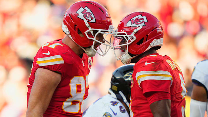 Kansas City Chiefs wide receiver JuJu Smith-Schuster (9) celebrates with Kansas City Chiefs tight end Travis Kelce (87) after a play during the third quarter against the Baltimore Ravens at GEHA Field at Arrowhead Stadium.