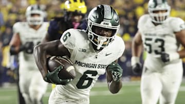 Oct 26, 2024; Ann Arbor, Michigan, USA;  Michigan State Spartans wide receiver Nick Marsh (6) runs the ball against the Michigan Wolverines at Michigan Stadium. Mandatory Credit: Rick Osentoski-Imagn Images