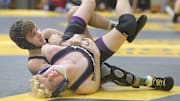 Massillon Perry (OH) 113-pounder Lincoln Rohr (left) scored a big win on Friday, posting a 10-2 major decision over Clovis (CA) wrestler Anthony Garza, who is ranked No. 2 nationally at 106.