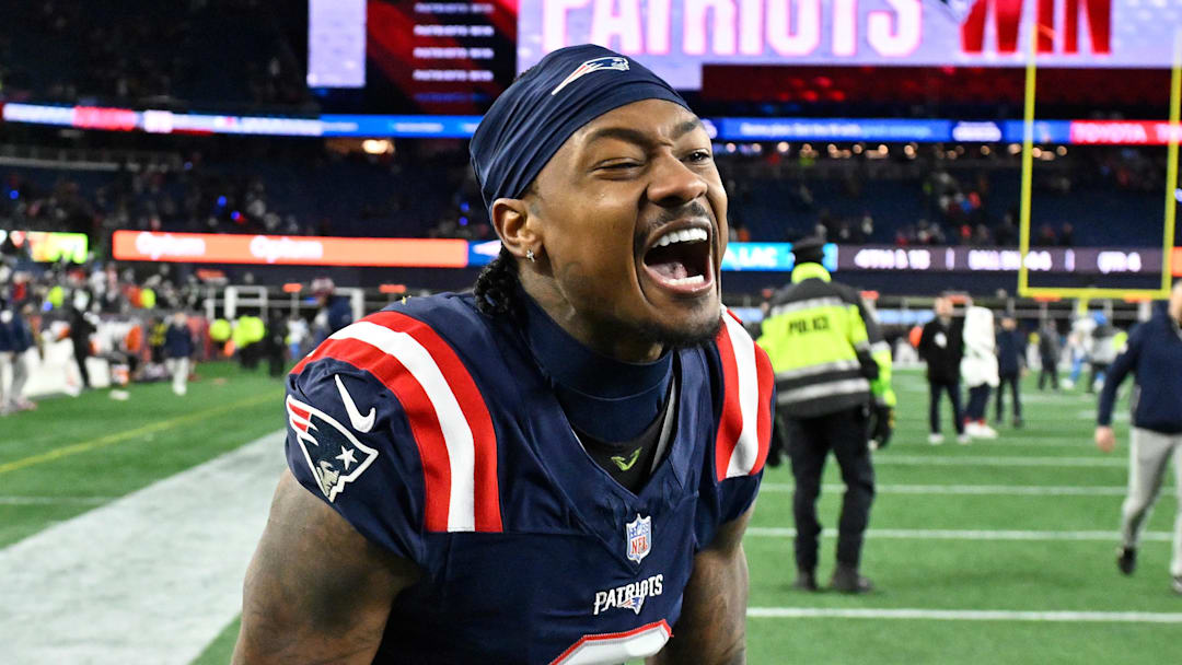 Jan 11, 2026; Foxborough, MA, USA; New England Patriots wide receiver Stefon Diggs (8) reacts after defeating the Los Angeles Chargers in an AFC Wild Card Round game at Gillette Stadium. Mandatory Credit: Eric Canha-Imagn Images