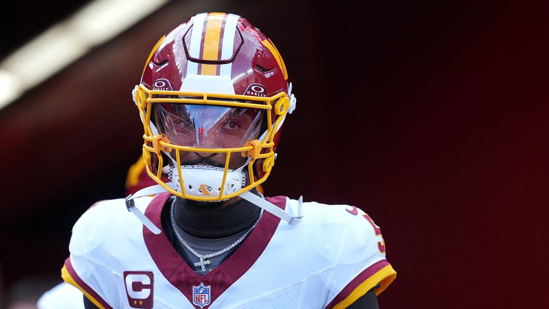 Oct 19, 2026; Santa Clara, California, USA;  Washington Commanders QB Jayden Daniels (5) takes the field for warm-ups before the game against the San Francisco 49ers at Levi's Stadium.  Mandatory Credit: Cary Edmondson
