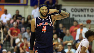 Nov 25, 2024; Lahaina, Hawaii, USA;  Auburn Tigers forward Johni Broome (4) reacts after scoring against the Iowa State Cyclones during the second half of an NCAA college basketball game at Lahaina Civic Center. Auburn defeated Iowa State 83-81. Mandatory Credit: Marco Garcia-Imagn Images