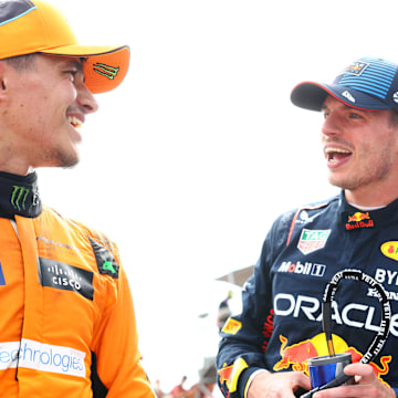 Race winner Max Verstappen of the Netherlands and Oracle Red Bull Racing and Second placed Lando Norris of Great Britain and McLaren talk in parc ferme during the F1 Grand Prix of Emilia-Romagna at Autodromo Enzo e Dino Ferrari Circuit on May 19, 2024 in Imola, Italy.