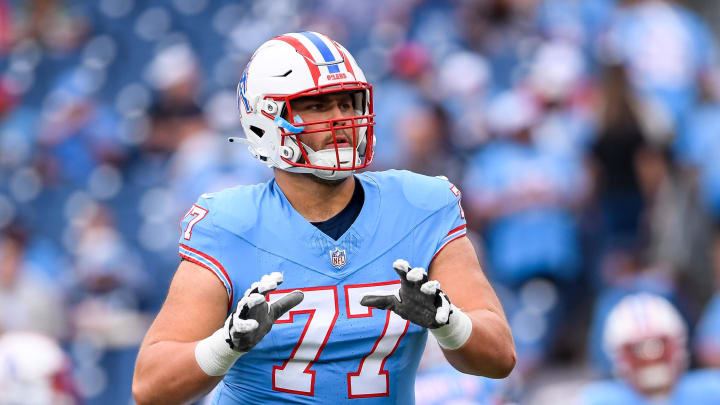 Oct 29, 2023; Nashville, Tennessee, USA;  Tennessee Titans offensive tackle Peter Skoronski (77) against the Atlanta Falcons during warmup at Nissan Stadium. Mandatory Credit: Steve Roberts-USA TODAY Sports