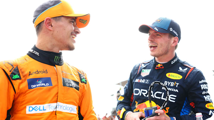 Race winner Max Verstappen of the Netherlands and Oracle Red Bull Racing and Second placed Lando Norris of Great Britain and McLaren talk in parc ferme during the F1 Grand Prix of Emilia-Romagna at Autodromo Enzo e Dino Ferrari Circuit on May 19, 2024 in Imola, Italy.