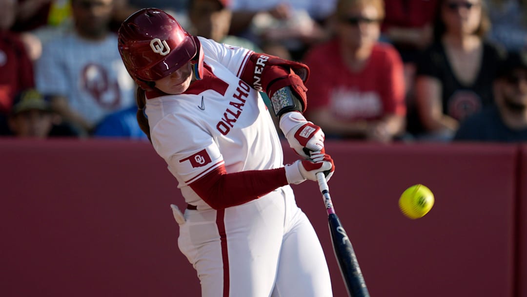 Oklahoma catcher Kendall Wells blasts a home run against Kentucky at Love's Field.