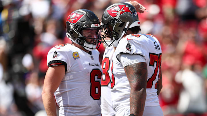 Sep 29, 2024; Tampa, Florida, USA; Tampa Bay Buccaneers offensive tackle Tristan Wirfs (78) congratulates quarterback Baker Mayfield (6) after a touchdown against the Philadelphia Eagles in the second quarter at Raymond James Stadium. Mandatory Credit: Nathan Ray Seebeck-Imagn Images