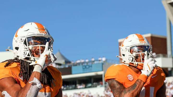 Sep 27, 2025; Starkville, Mississippi, USA; Tennessee Volunteers wide receiver Chris Brazzell II (17) and wide receiver Braylon Staley (14) celebrate after a touchdown against the Mississippi State Bulldogs during the first half at Davis Wade Stadium at Scott Field. Mandatory Credit: Wesley Hale-Imagn Images
