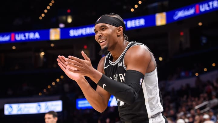 Oct 9, 2023; Oklahoma City, Oklahoma, USA; San Antonio Spurs guard Devonte' Graham (4) reacts during the second half against the Oklahoma City Thunder at Paycom Center. Mandatory Credit: Rob Ferguson-USA TODAY Sports