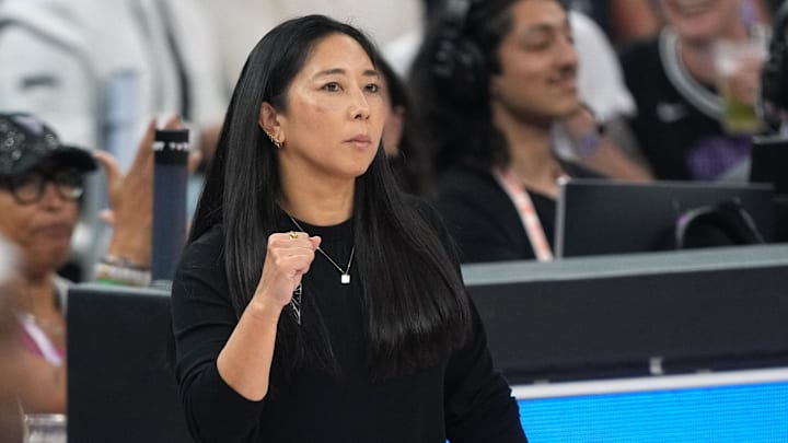 Golden State Valkyries head coach Natalie Nakase reacts after a basket by guard Kaila Charles (not shown) during the first quarter against the Indiana Fever at Chase Center. 
