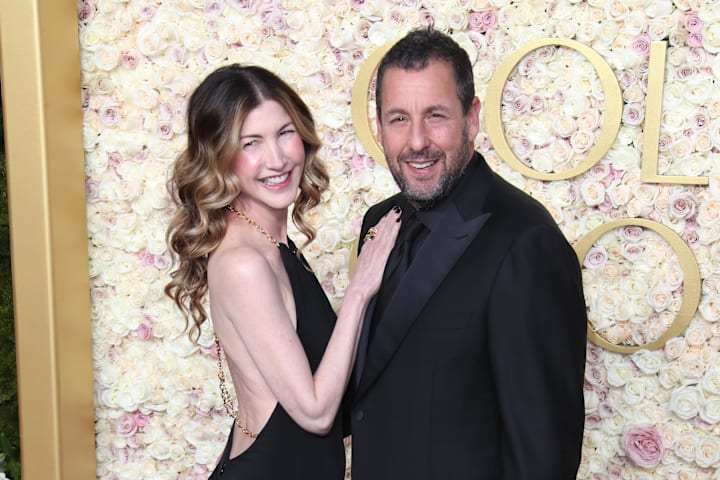  Adam Sandler and Jackie Sandler at the 82nd Annual Golden Globe Awards at the Beverly Hilton Hotel.