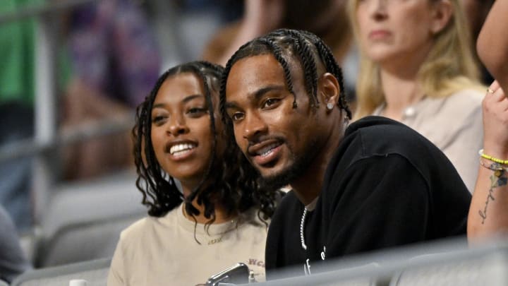 Jun 2, 2024; Fort Worth, Texas, USA; Chicago Bears safety Jonathan Owens watches his wife Simone Biles (not pictured) as she performs during day two of the women’s 2024 Xfinity U.S. Gymnastics Championships at Dickies Arena. Mandatory Credit: Jerome Miron-USA TODAY Sports