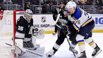 Mar 8, 2025; Los Angeles, California, USA; Los Angeles Kings goaltender Darcy Kuemper (35) saves a shot against St. Louis Blues center Zack Bolduc (76) during the third period at Crypto.com Arena. Mandatory Credit: Ryan Sun-Imagn Images