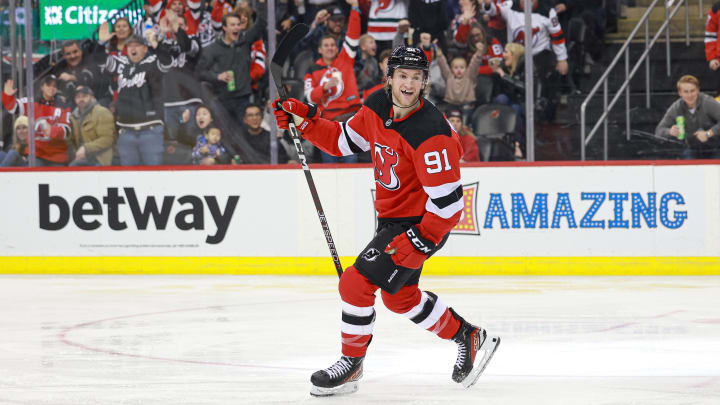 Dec 13, 2023; Newark, New Jersey, USA; New Jersey Devils center Dawson Mercer (91) celebrates his goal during the third period against the Boston Bruins at Prudential Center. Mandatory Credit: Vincent Carchietta-USA TODAY Sports 