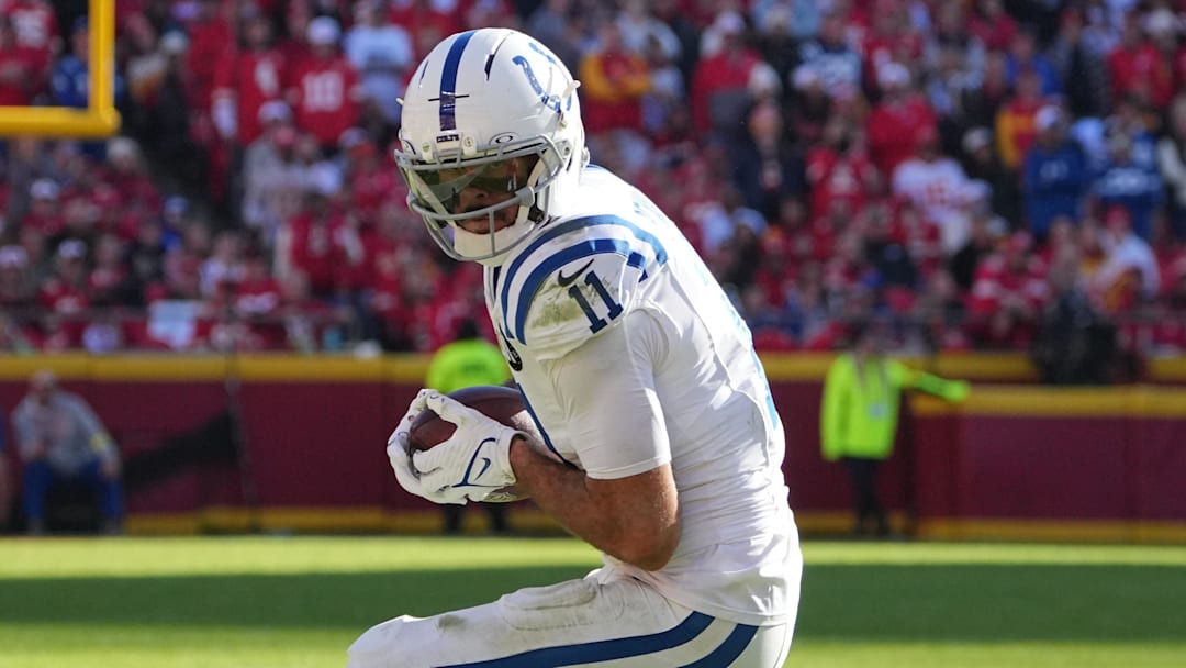Nov 23, 2025; Kansas City, Missouri, USA;  Indianapolis Colts wide receiver Michael Pittman Jr. (11) makes a catch against Kansas City Chiefs cornerback Trent McDuffie (22) in the second half at GEHA Field at Arrowhead Stadium. Mandatory Credit: Denny Medley-Imagn Images