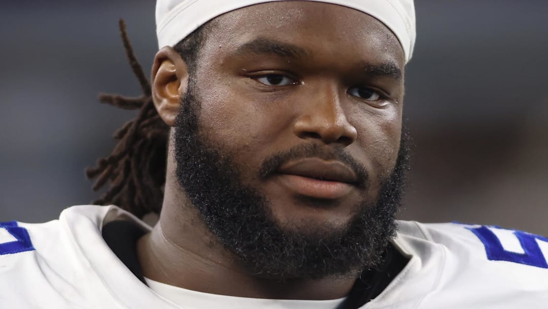 Aug 26, 2023; Arlington, Texas, USA; Dallas Cowboys defensive tackle Mazi Smith (58) on the sidelines during the game against the Las Vegas Raiders at AT&T Stadium.