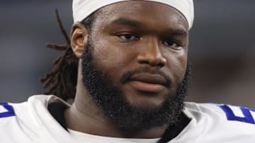 Aug 26, 2023; Arlington, Texas, USA; Dallas Cowboys defensive tackle Mazi Smith (58) on the sidelines during the game against the Las Vegas Raiders at AT&T Stadium.