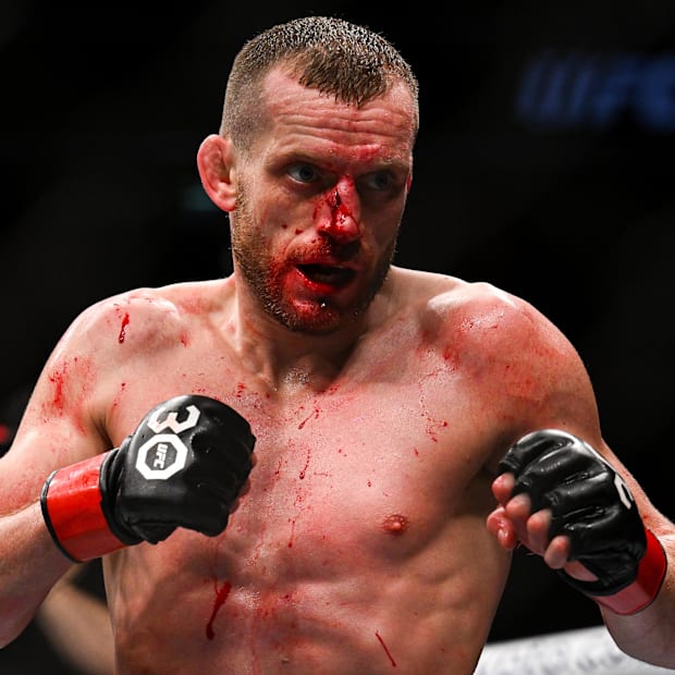 Davey Grant (red gloves) fights Daniel Marcos (blue gloves) during UFC Fight Night at O2 Arena.