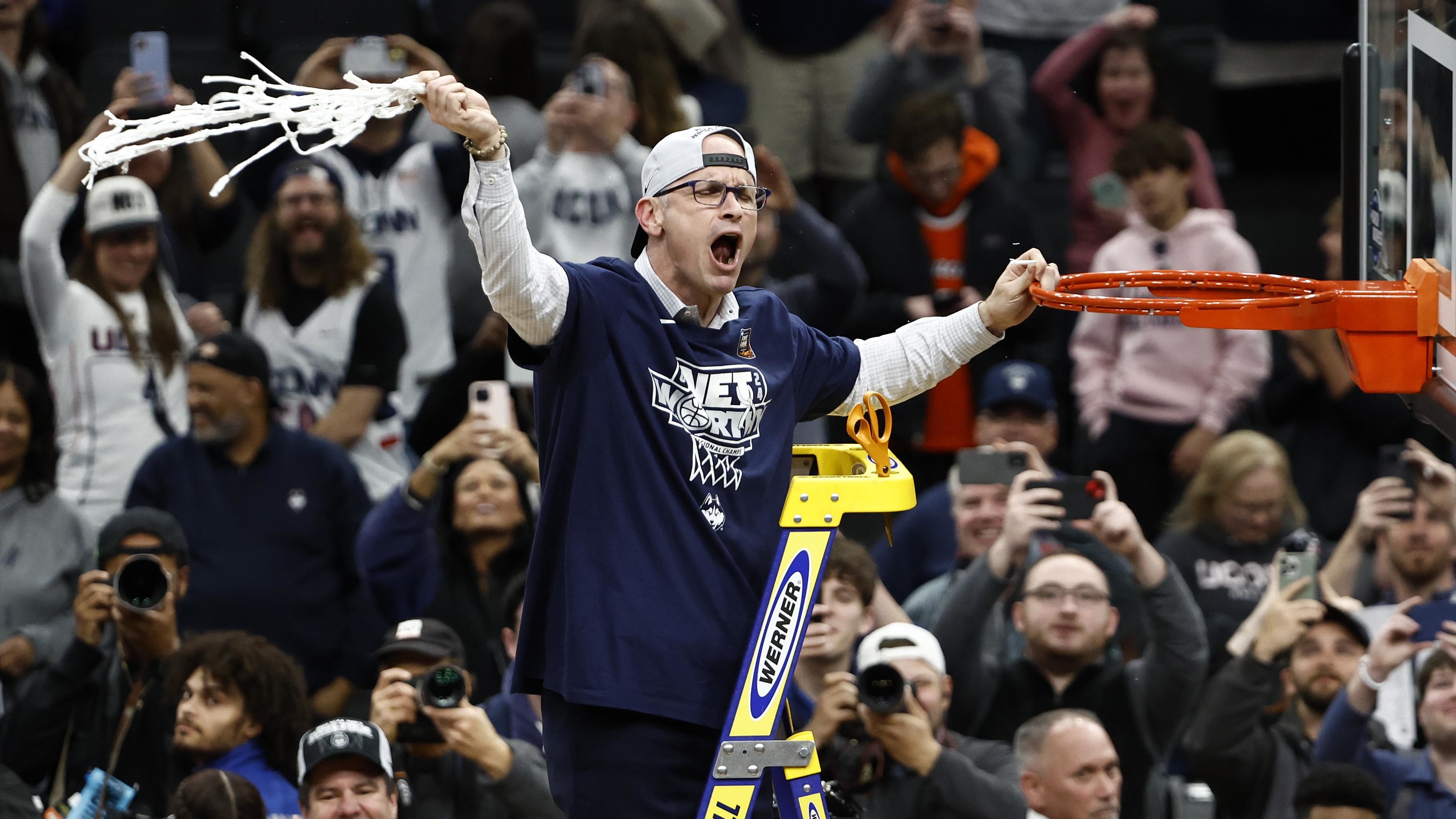 Dan Hurley reacts after cutting the net