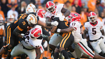 Tennessee running back Jabari Small (2) is tackled during an SEC football homecoming game between the Tennessee Volunteers and the Georgia Bulldogs in Neyland Stadium in Knoxville on Saturday, Nov. 13, 2021.