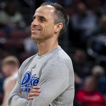 Mar 19, 2025; Wichita, KS, USA;  Drake Bulldogs head coach Ben McCollum watches his team during a practice session at Intrust Bank Arena. Mandatory Credit: Nick Tre. Smith-Imagn Images