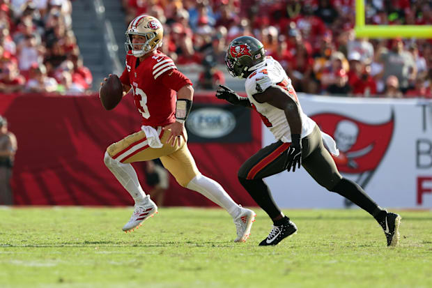 Nov 10, 2024; Tampa, Florida, USA; 49ers’ Brock Purdy runs out of the pocket vs. Buccaneers.