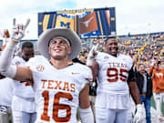 Texas beat Michigan, 31-12. 