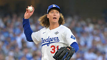 Oct. 27, 2025; Los Angeles, California, USA; Los Angeles Dodgers pitcher Tyler Glasnow (31) throws to first for an out against Toronto Blue Jays second baseman Bo Bichette (11) in the second inning during game three of the 2025 MLB World Series at Dodger Stadium.