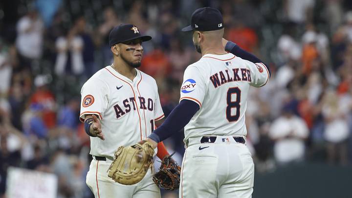 Apr 29, 2025; Houston, Texas, USA; Houston Astros third baseman Isaac Paredes (15) and first baseman Christian Walker (8) celebrate after the game against the Detroit Tigers at Daikin Park. Mandatory Credit: Troy Taormina-Imagn Images
