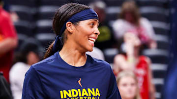 Indiana Fever guard Sydney Colson (51) smiles while warming up Tuesday, June 17, 2025, before a game between the Indiana Fever and the Connecticut Sun at Gainbridge Fieldhouse in Indianapolis.