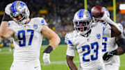 Detroit Lions cornerback Jerry Jacobs (23) celebrates with defensive end Aidan Hutchinson (97) after intercepting a pass against the Green Bay Packers during their football game on Thursday, September 28, 2023, at Lambeau Field in Green Bay, Wis. The Lions won the game, 34-20.
Tork Mason/USA TODAY NETWORK-Wisconsin