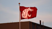 Sep 29, 2018; Pullman, WA, USA; Washington State Cougars school flag flies during football game against the Utah Utes in the 2nd half at Martin Stadium. The Cougar won 28-24. Mandatory Credit: James Snook-Imagn Images