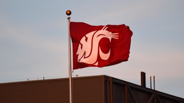 Sep 29, 2018; Pullman, WA, USA; Washington State Cougars school flag flies during football game against the Utah Utes in the 2nd half at Martin Stadium. The Cougar won 28-24. Mandatory Credit: James Snook-Imagn Images