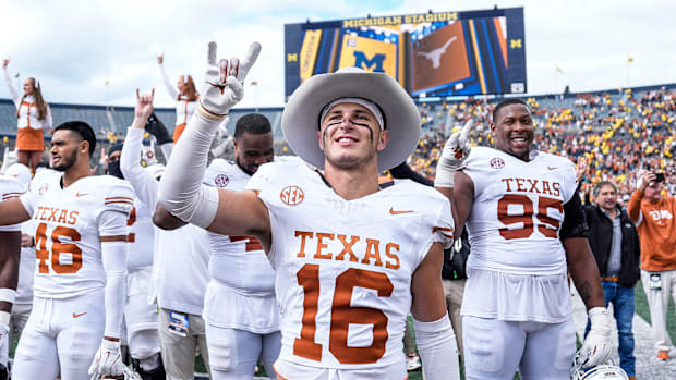 Texas players celebrate 31-12 win over Michigan at Michigan Stadium in Ann Arbor on Saturday, September 7, 2024.