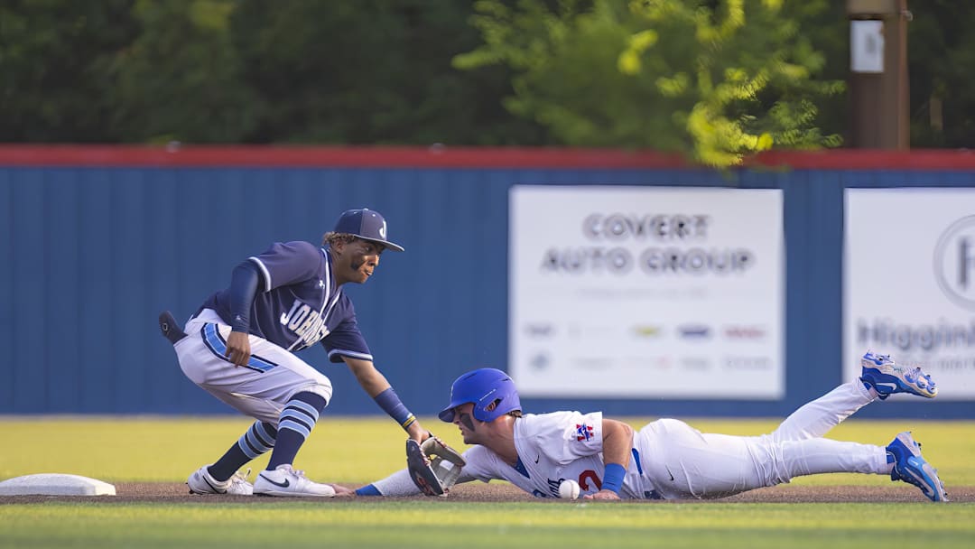 Westlake Chaparrals Blake Peterson (2) slides into 2nd base ahead of the tag from SA Johnson Jaguars Kayson Cunningham (6) at the UIL Regional IV Final 6A  baseball Round 1 playoff on Thursday, June 1, 2023, at Westlake High School in West Lake Hills, TX.