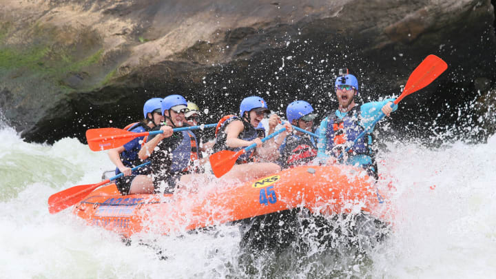 White water rafters enjoying the wild ride.