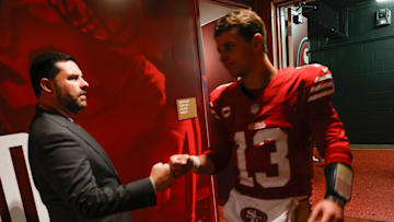 San Francisco 49ers CEO Jed York (L) and quarterback Brock Purdy (R)